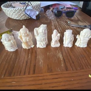 6 hand carved Buddha men